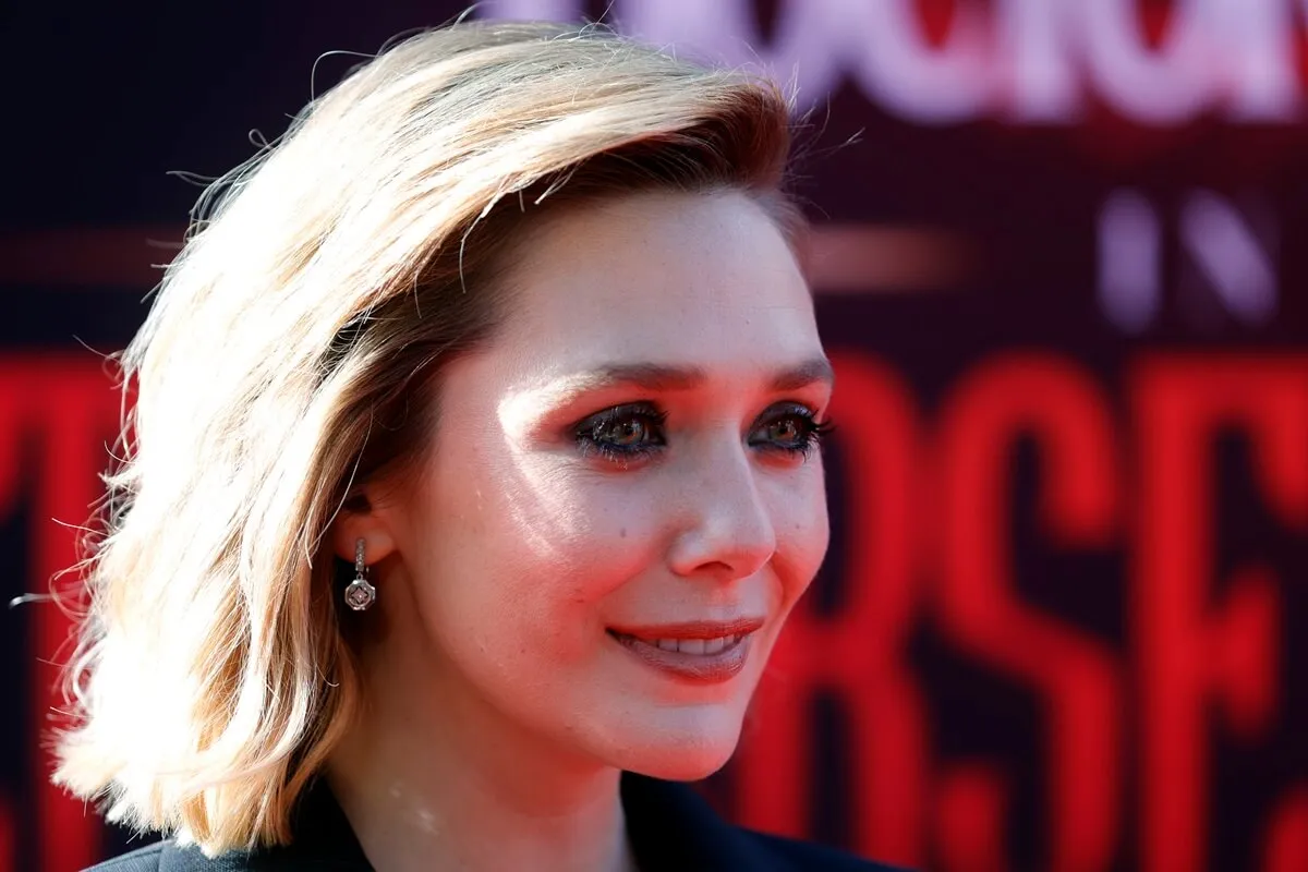 Elizabeth Olsen attends Marvel Studios "Doctor Strange In The Multiverse Of Madness" premiere.