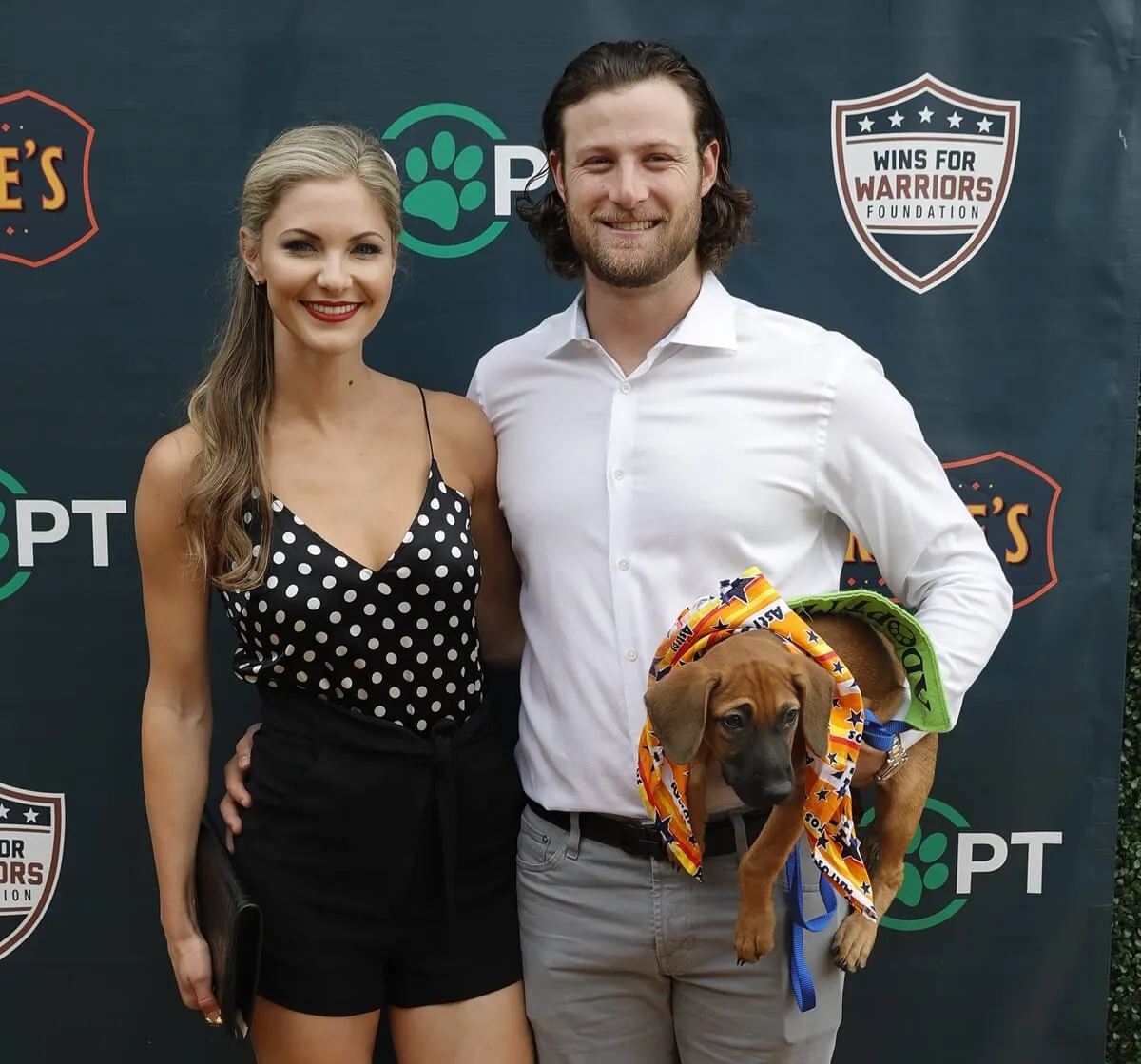 Gerrit Cole and his wife, Amy Crawford Cole, attend a reception for Grand Slam Adoption Event and Wins For Warriors Foundation