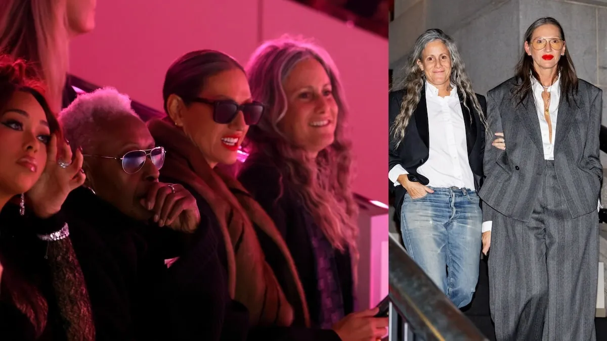 Engaged couple Cass Bird and Jenna Lyons sit together at the Giorgio Armani Women's SS25 Fashion Show