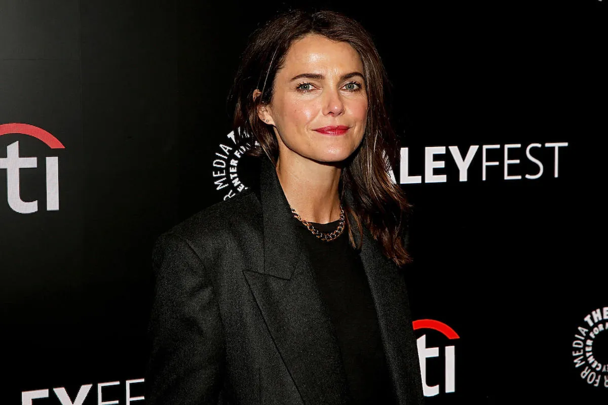 Keri Russell, who stars in 'The Diplomat, looks on wearing a blazer