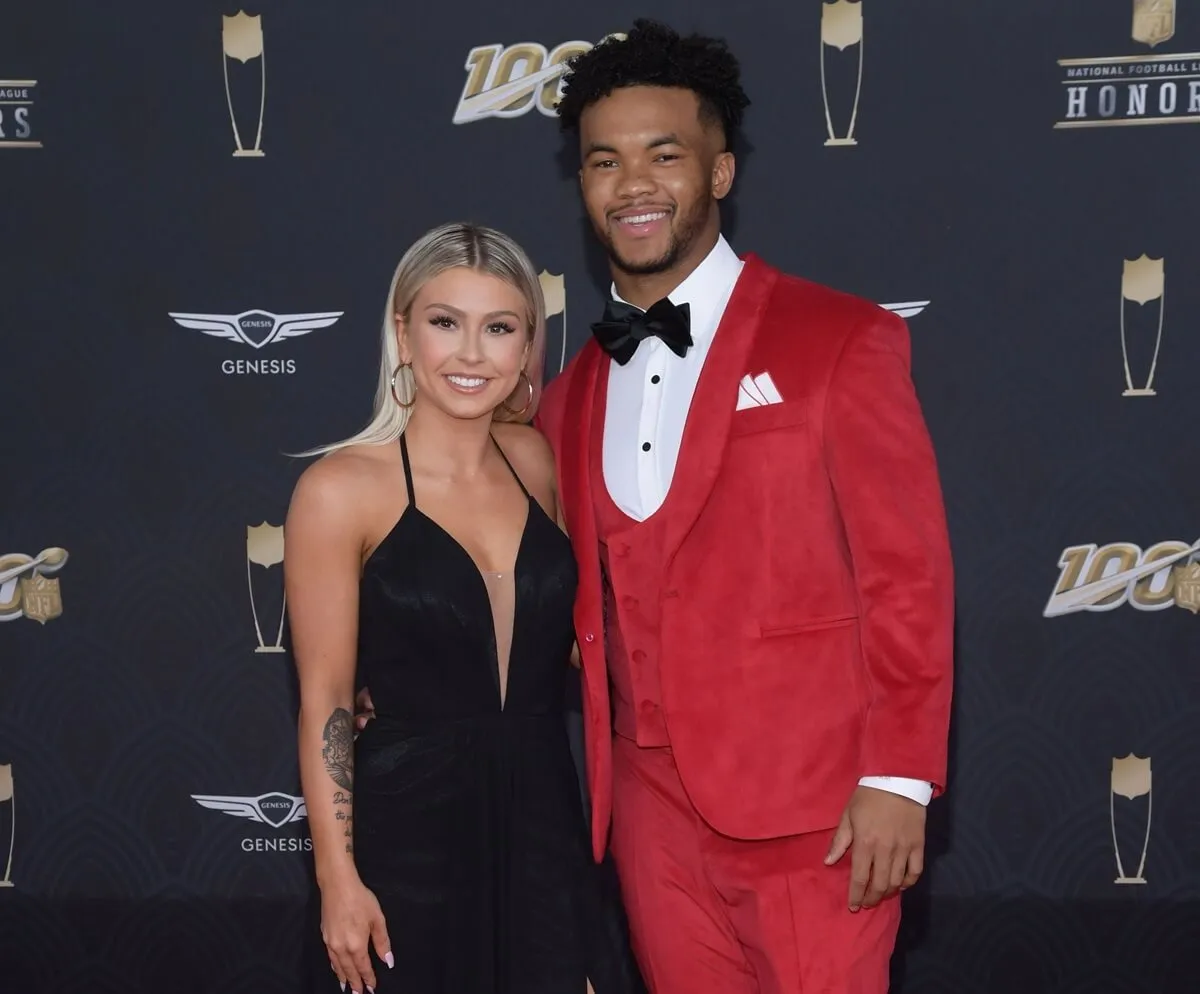 Kyler Murray and Morgan LeMasters pose on the red carpet at NFL Honors