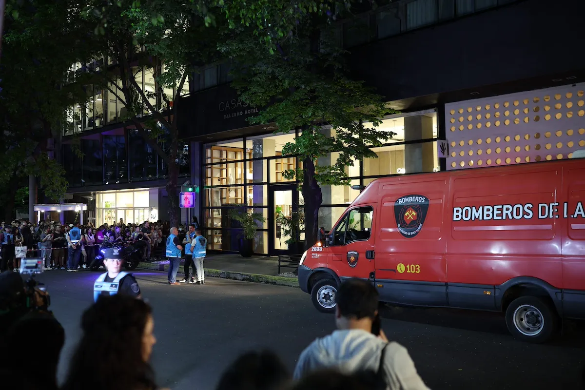 An ambulance and crowds outside the Casa Sur hotel in Buenos Aires following the death of Liam Payne