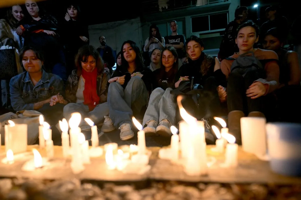 Fans mourn the loss of Liam Payne and light candles outside of the hotel where he died