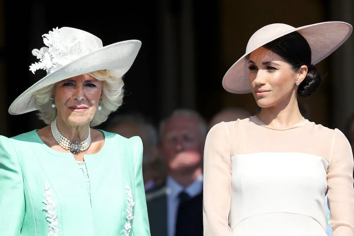 Meghan Markle, who posted to Instagram the same day Queen Camilla gave a 2020 speech, with Queen Camilla in 2018