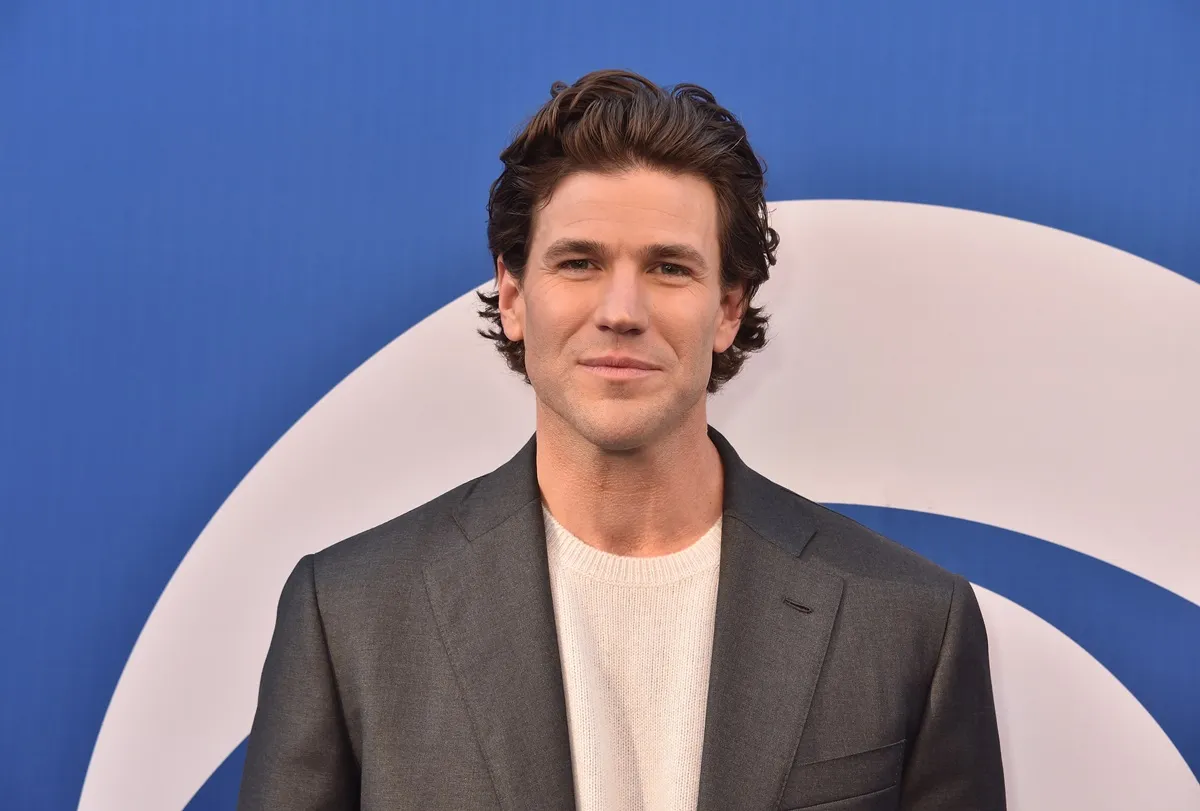 Austin Stowell posing at the CBS fall schedule celebration held at Paramount Studios.