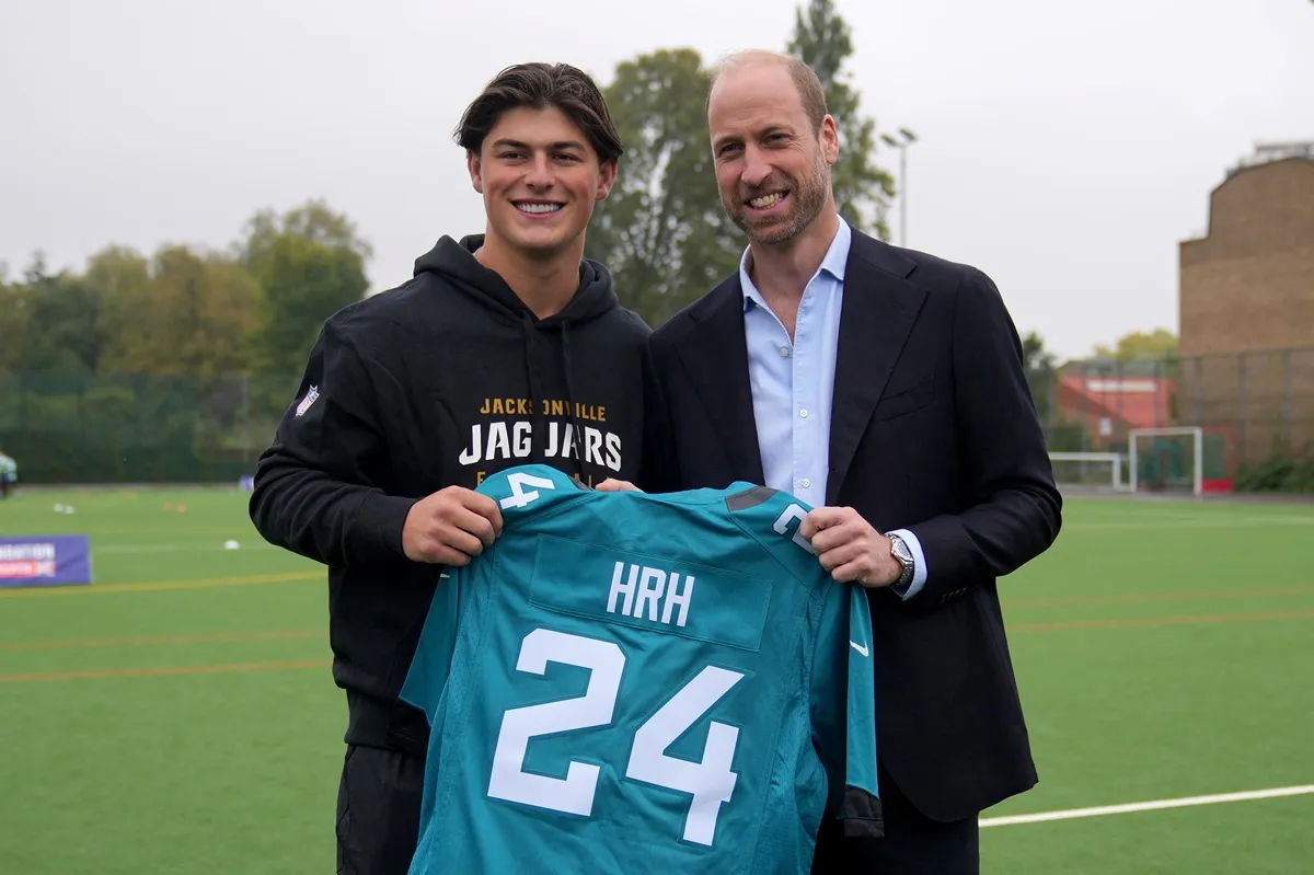 Prince William poses with Jacksonville Jaguars wideout Louis Rees-Zammit as they attends a NFL Foundation flag football event