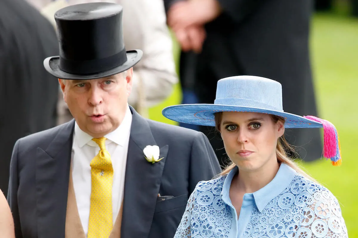 Princess Beatrice, who is avoiding her father after 'A Very Royal Scandal,' stands in front of Prince Andrew