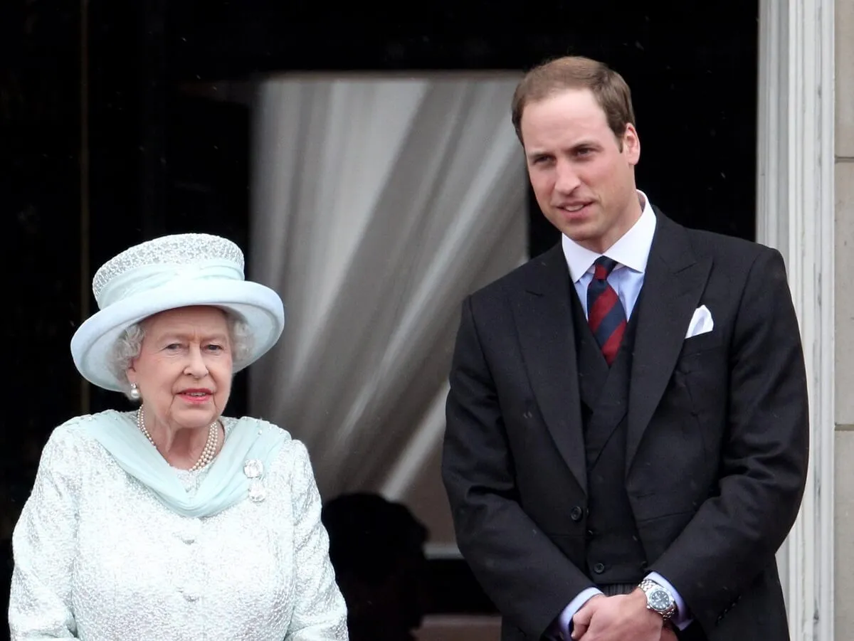 Queen Elizabeth II and Prince William on the balcony of Buckingham Palace after the service of thanksgiving at St. Paul’s Cathedral