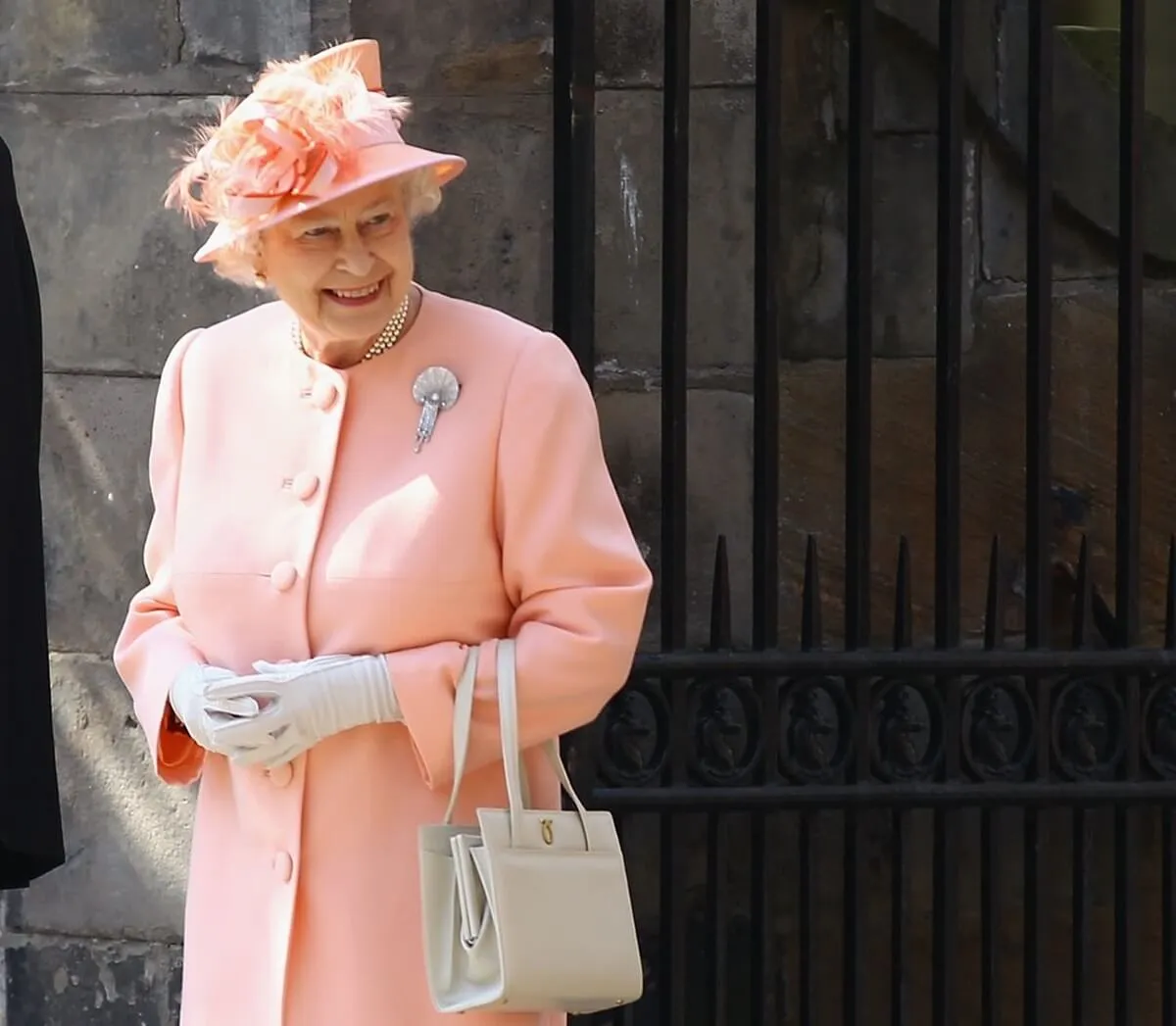 Queen Elizabeth II departs after the royal wedding of Zara Phillips and Mike Tindall at Canongate Kirk in Edinburgh, Scotland