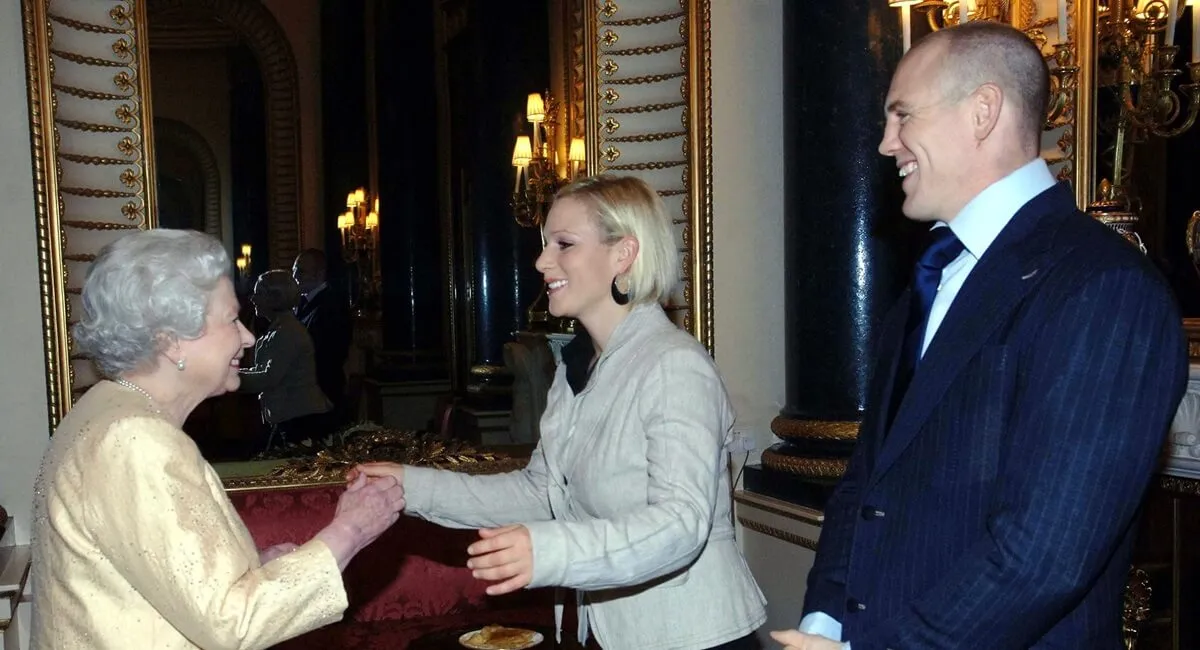 Queen Elizabeth ll greets her granddaughter, Zara, and Mike Tindall at a Buckingham Palace reception