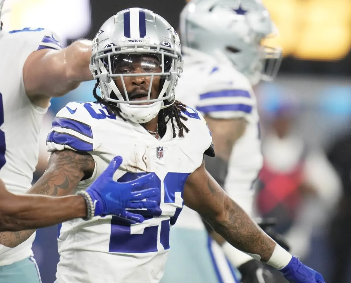 Rico Dowdle of the Dallas Cowboys celebrates after running for a touchdown against the Los Angeles Chargers