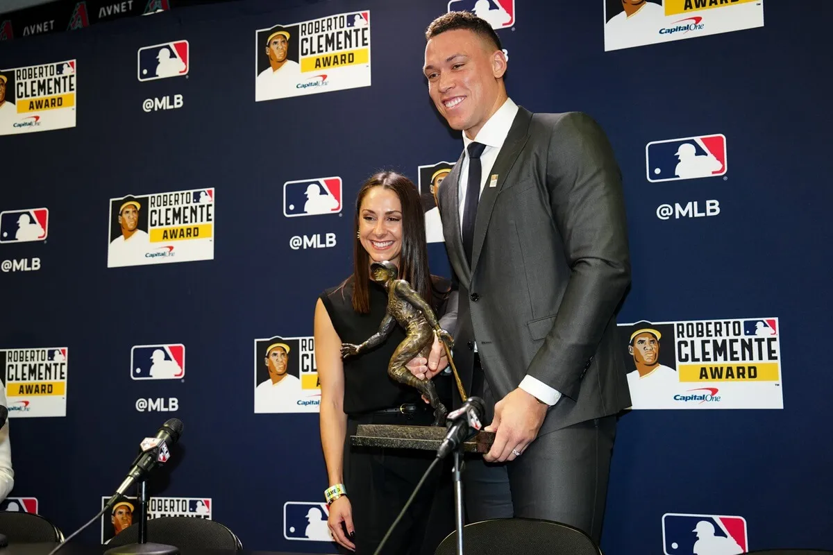 Roberto Clemente Award 2023 recipient Aaron Judge poses for a photo with his wife, Samantha Bracksieck