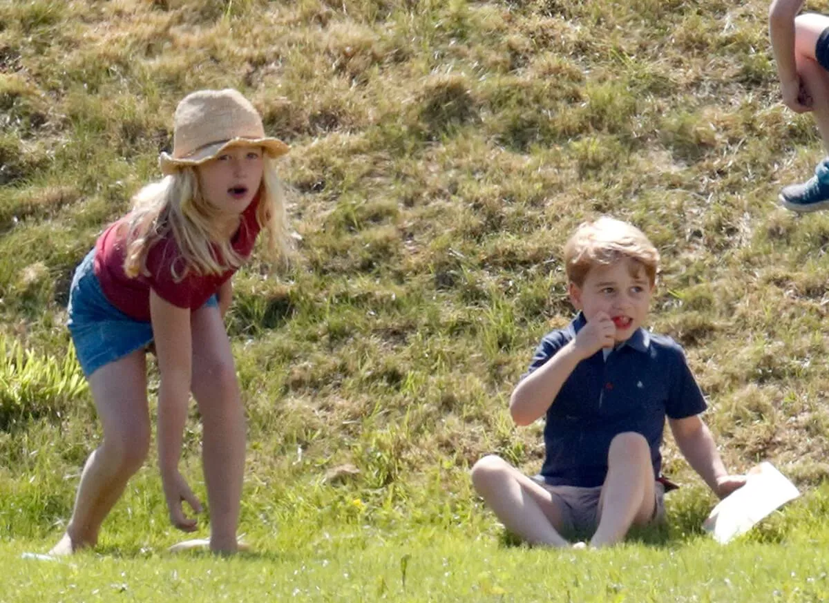 Savannah Phillips and Prince George during an outing with their parents at the Maserati Royal Charity Polo match