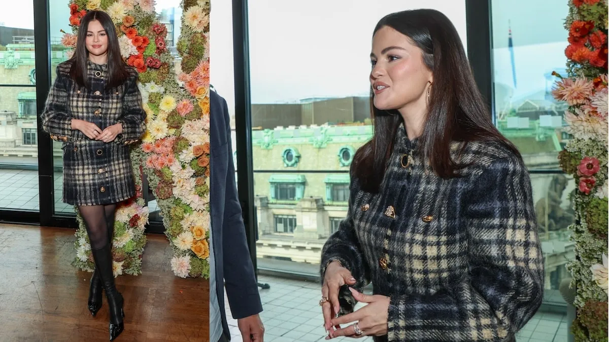 Wearing a plaid coat dress, Selena Gomez talks with guests at the Netflix Awards Brunch