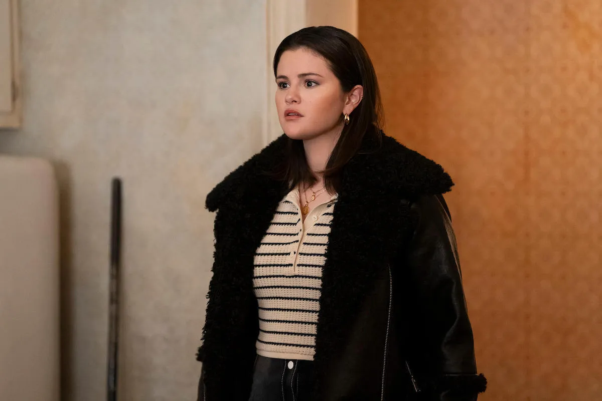 Selena Gomez wears a sweater and coat as Mabel Mora in 'Only Murders in the Building' Season 4