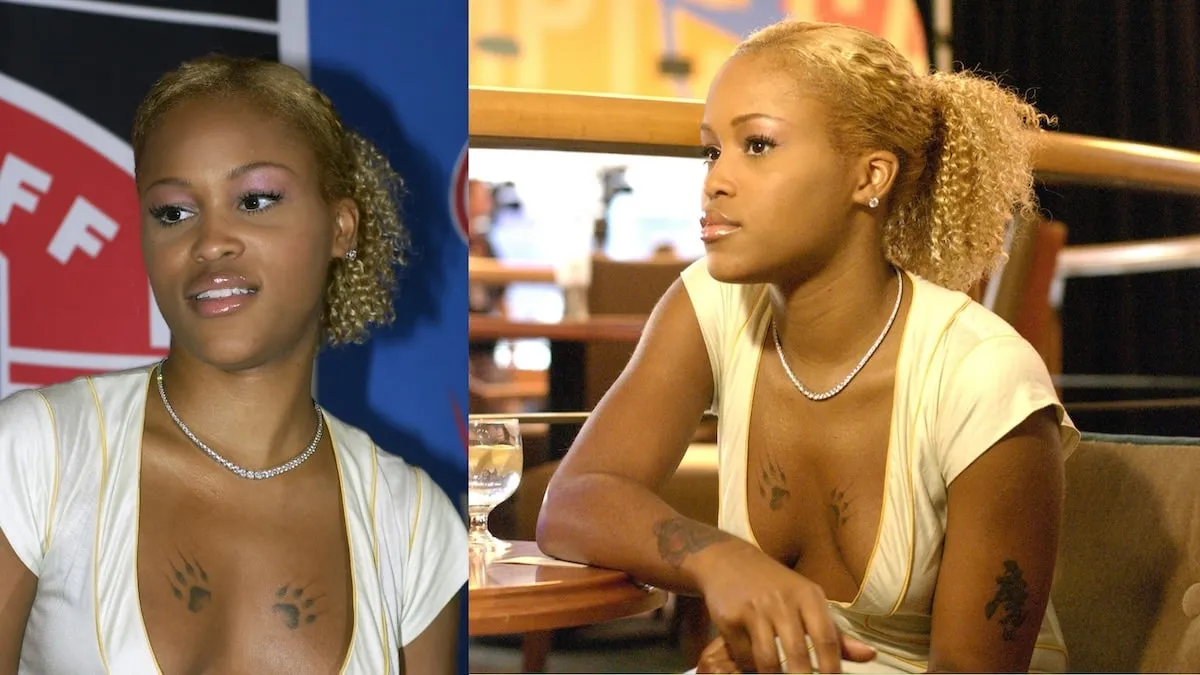 Wearing a yellow tee shirt, Eve sits at a table before she performs as part of the NFL's 2002 Kickoff Concert