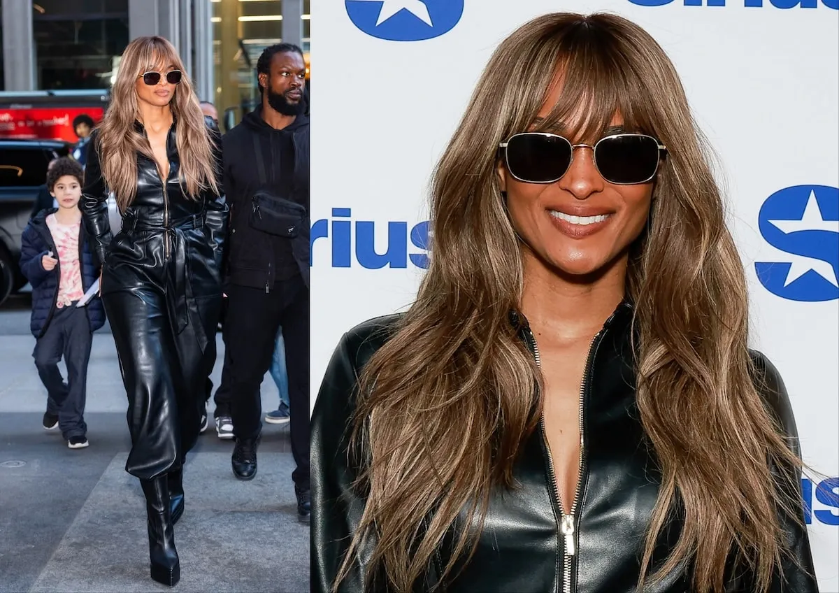 Singer Ciara wears a black leather jumpsuit and smiles at the camera as she walks down an NYC street