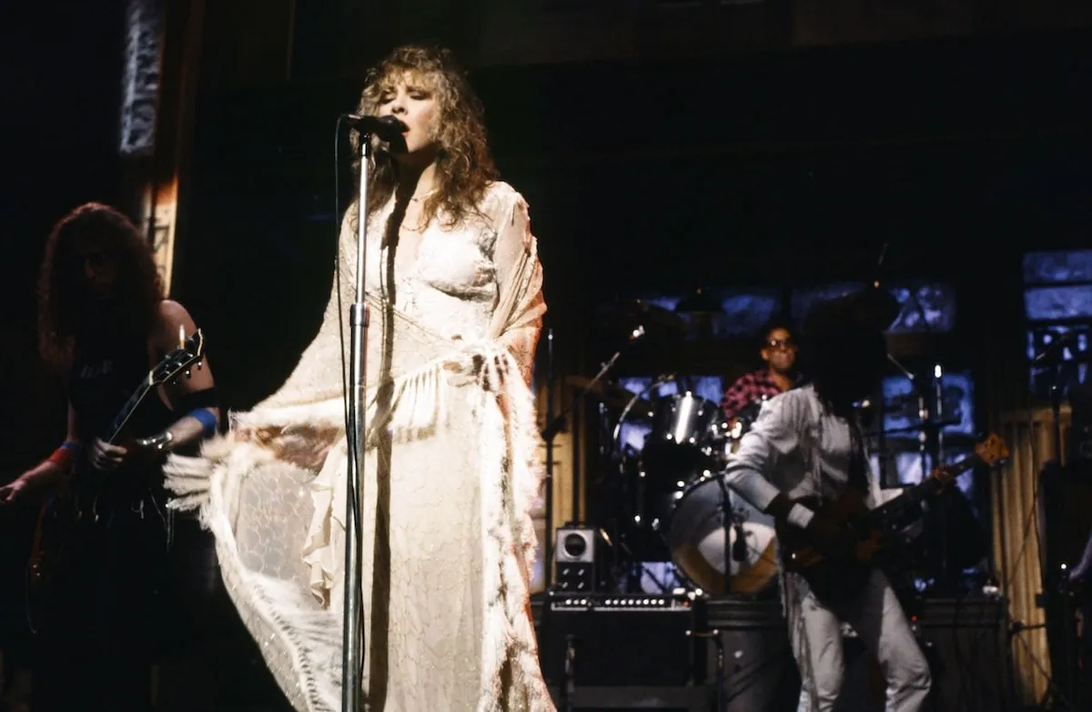 Wearing a white lacy gown, Stevie Nicks performs on December 10, 1983, on 'Saturday Night' Live