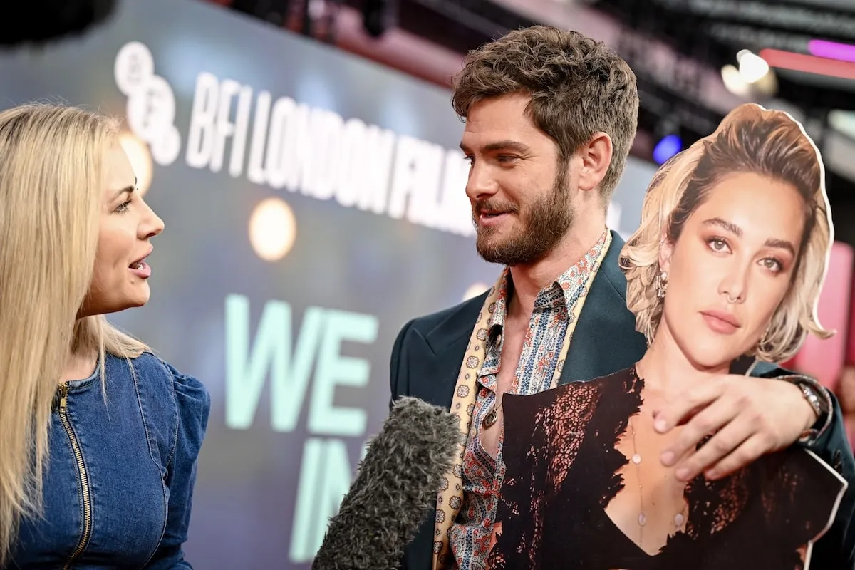 Actor Andrew Garfield poses with a cardboard cutout of Florence Pugh during the "We Live In Time" Headline Gala