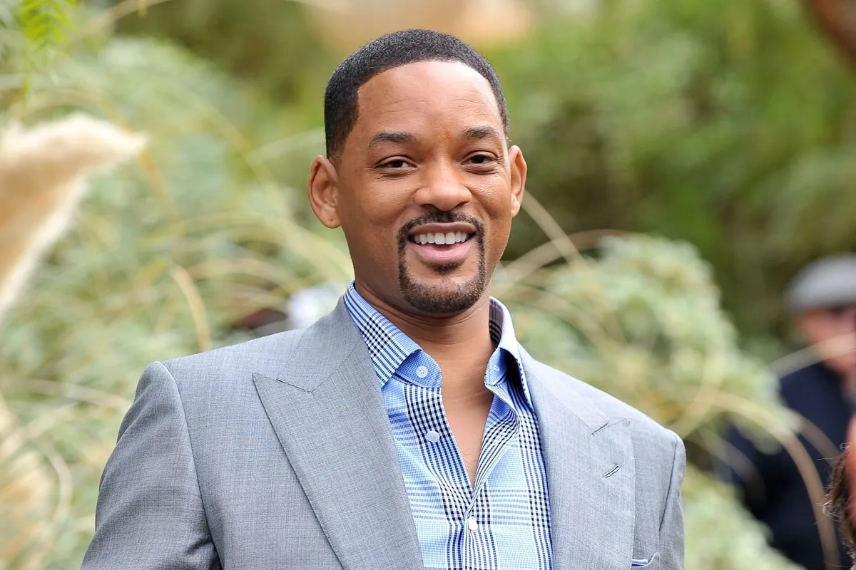 Will Smith attends Variety's Creative Impact Awards while wearing a blue suit.