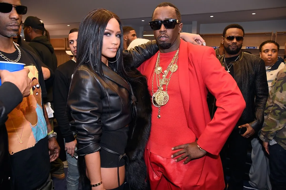 Sean 'Diddy' Combs and Cassie posing backstage during the Puff Daddy and The Family Bad Boy Reunion Tour.