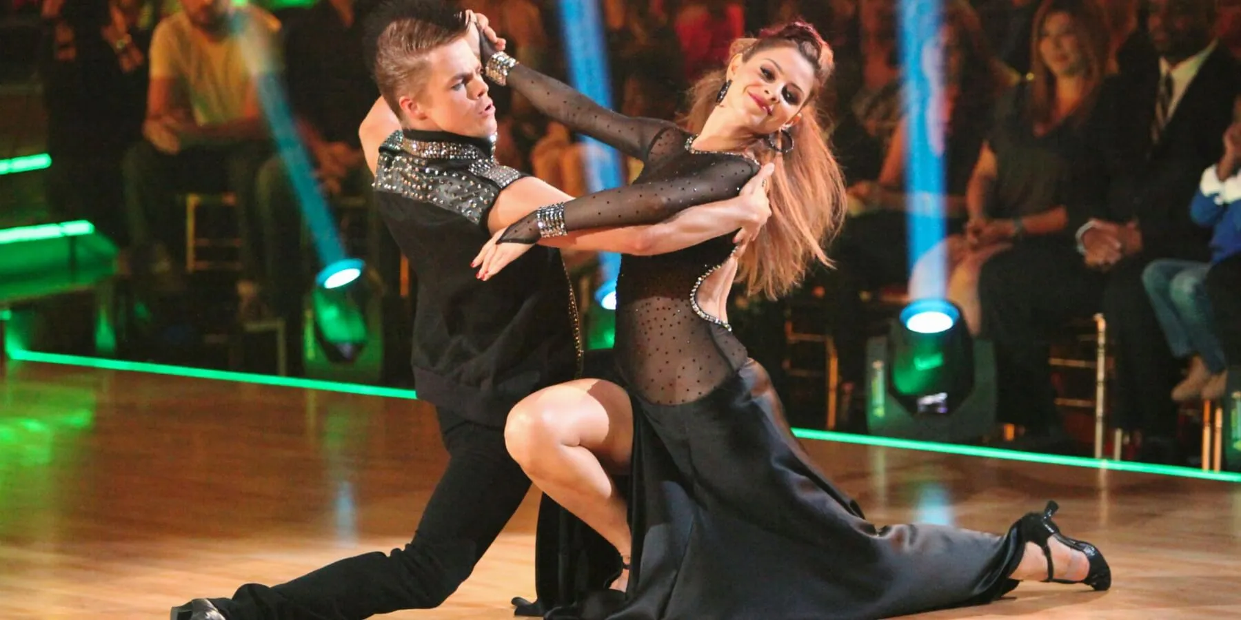 Derek Hough and Maria Menounos perform during 2012's Rock Night on 'Dancing with the Stars.'