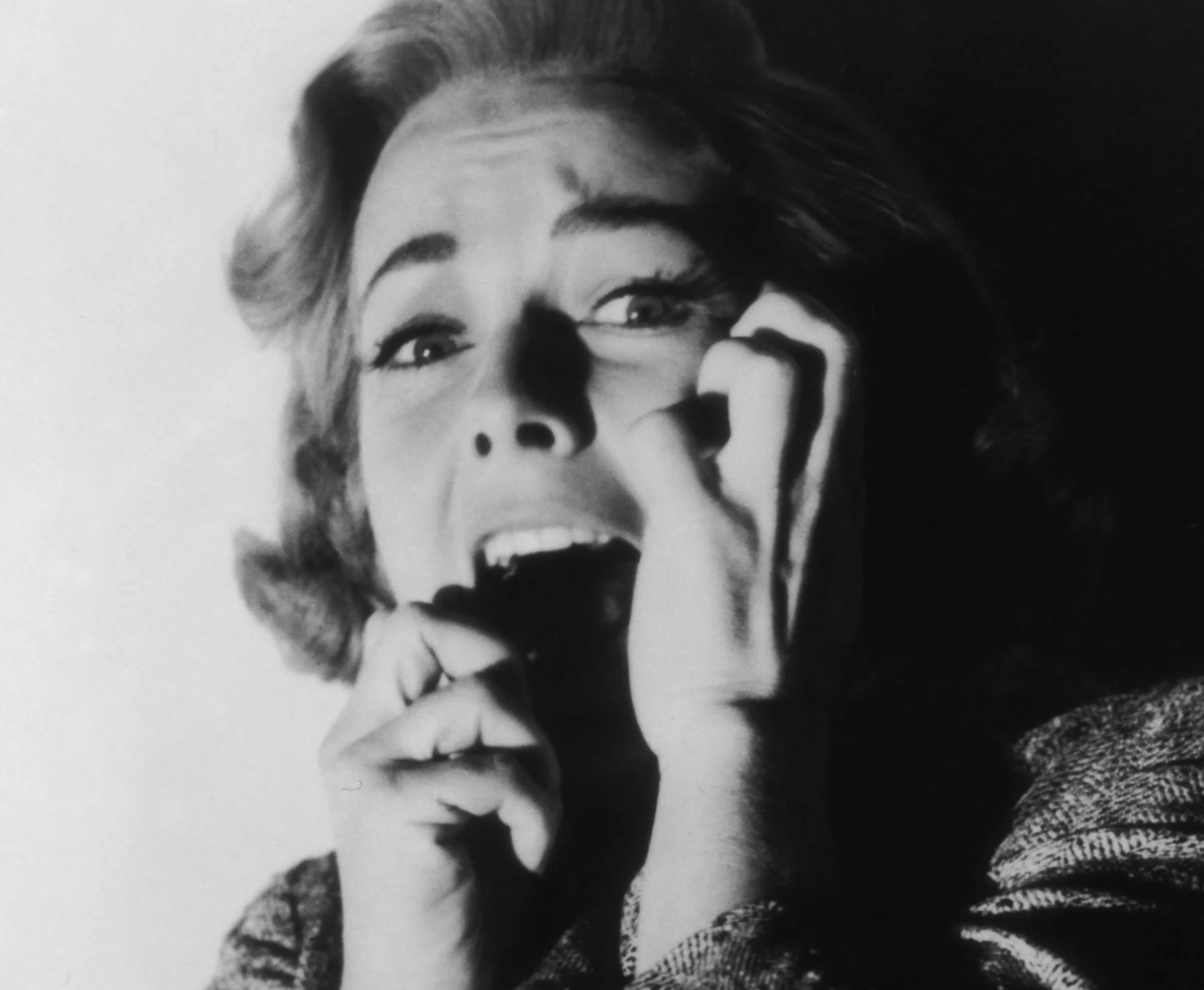 Vera Miles looking frightened in promotional material for the horror film 'Psycho'