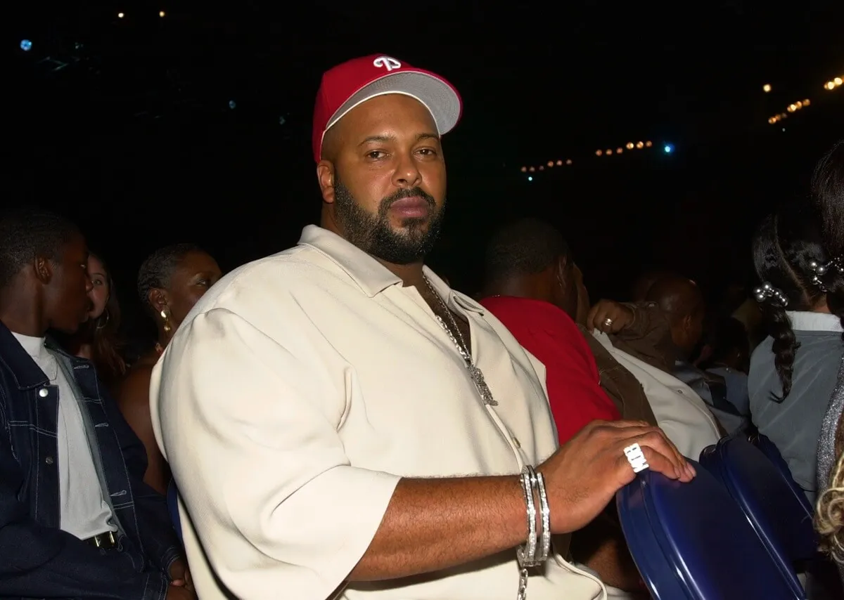 Suge Knight posing in a white button up shirt at the Soul Train Lady Of Soul Awards.