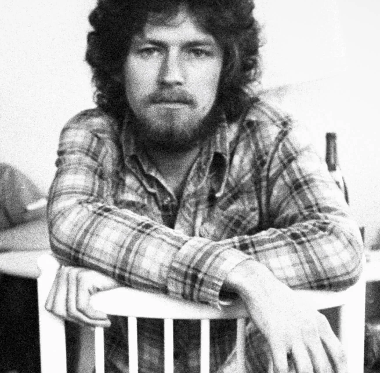 The Eagles' Don Henley sitting in a chair