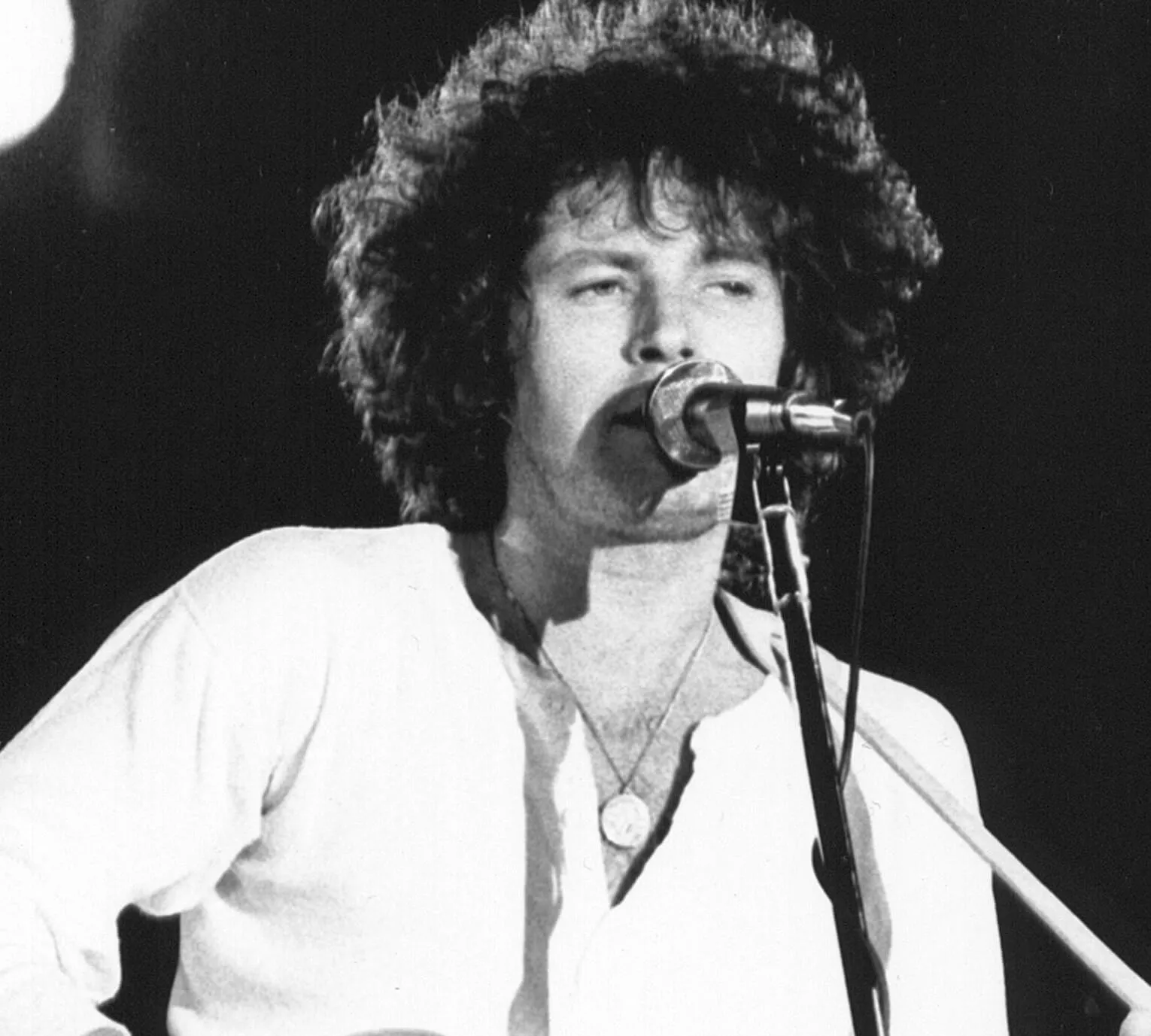 The Eagles' Don Henley with a microphone