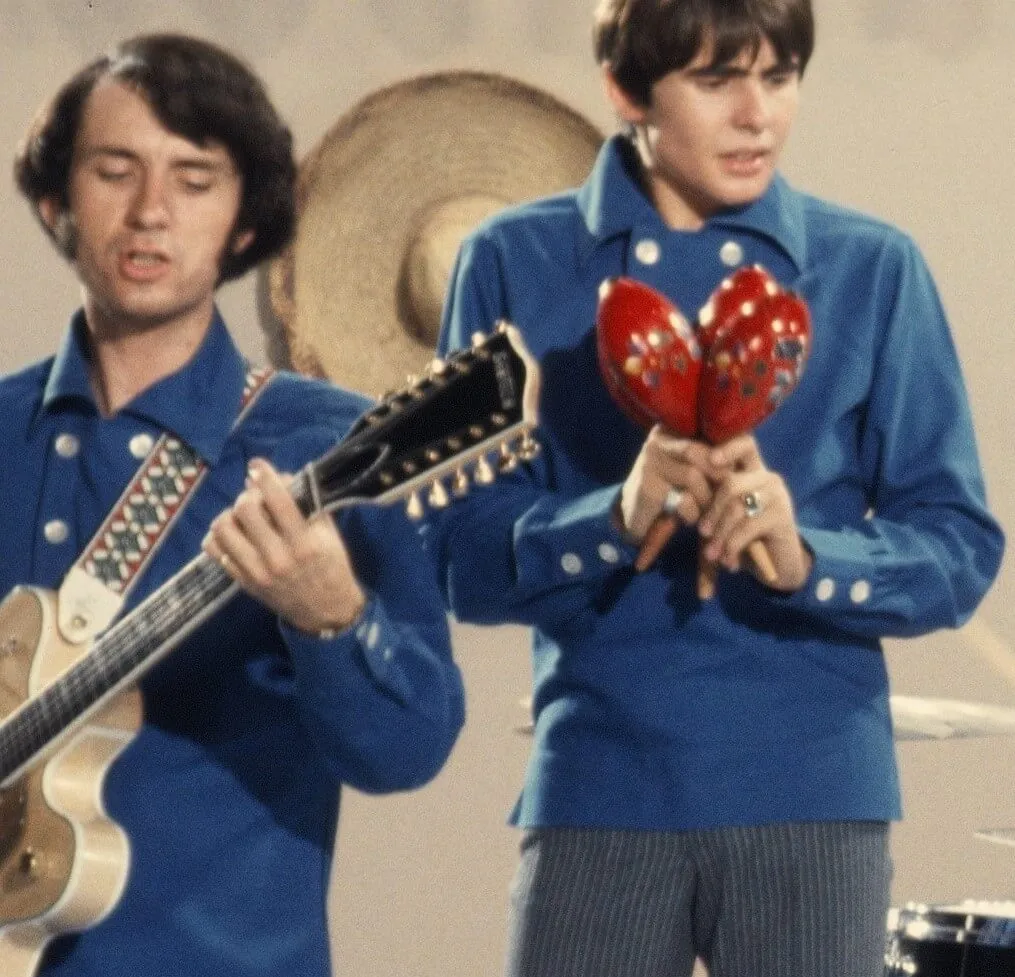 The Monkees' Mike Nesmith and Davy Jones wearing blue