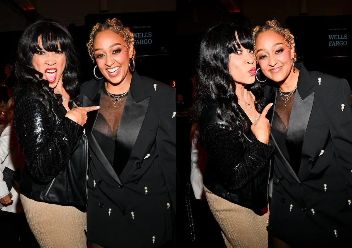 Smiling together in black, Jackée Harry and Tia Mowry pose at the 2024 Variety Power of Women event