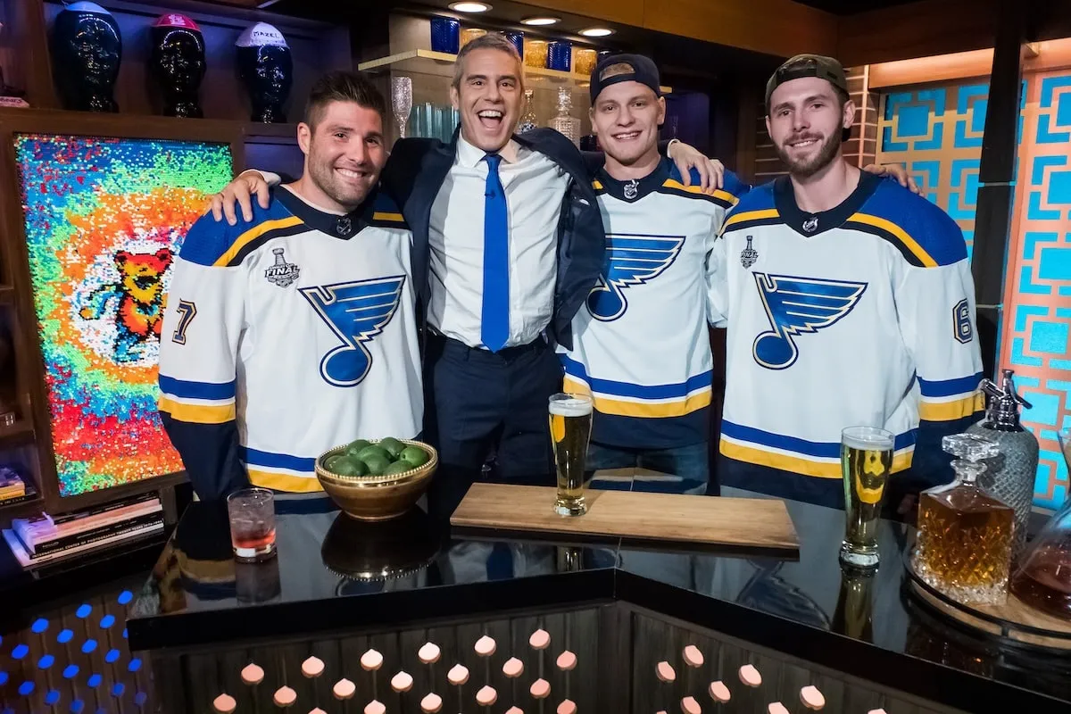 Hockey players from the St. Louis Blues, Patrick Maroon, Colton Parayko, and Joel Edmundson, pose with Andy Cohen on 'Watch What Happens Live'