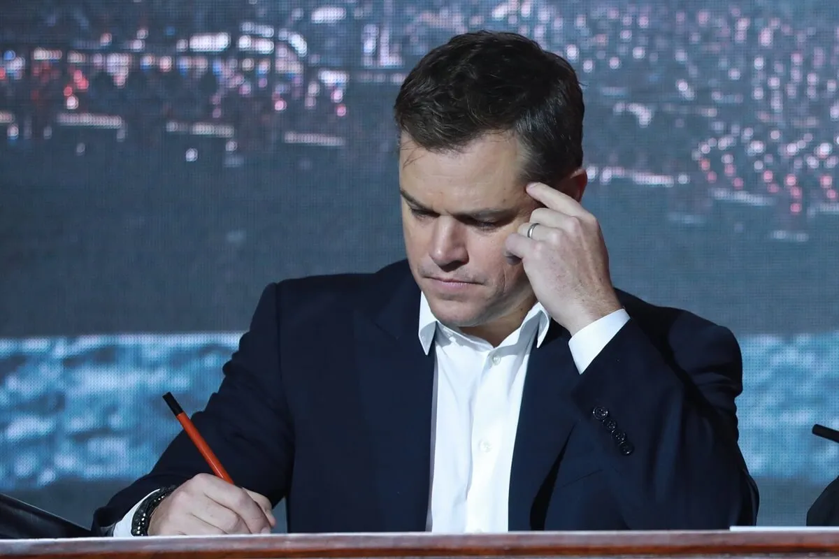 Matt Damon writing at the Beiging premiere of 'The Great Wall'.