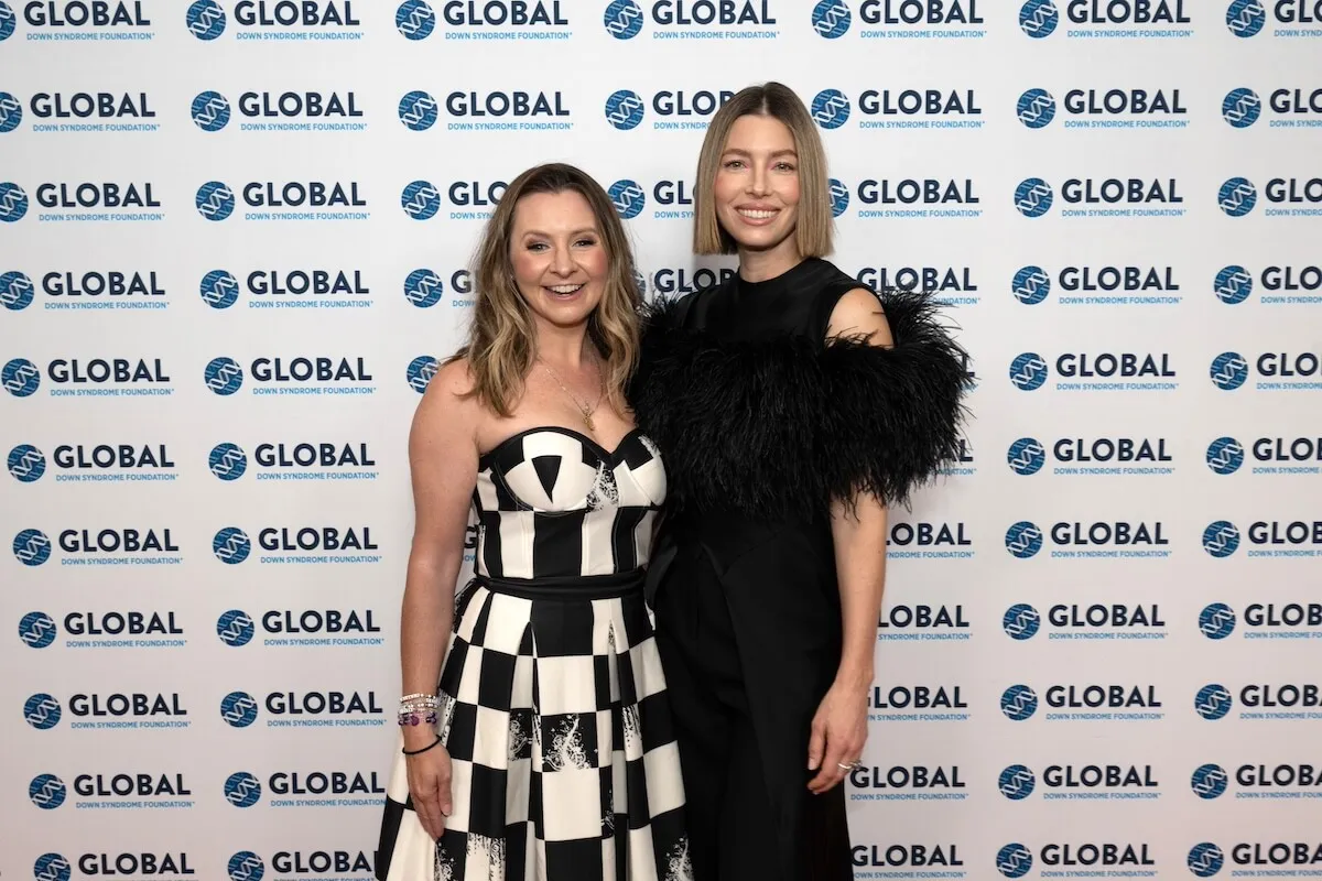 Beverley Mitchell and Jessica Biel pose for a photo together at an event in 2024