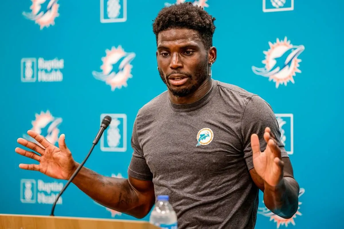 Dolphins wideout Tyreek Hill speaks to reporters at Baptist Health Training Complex in Miami Gardens, Florida