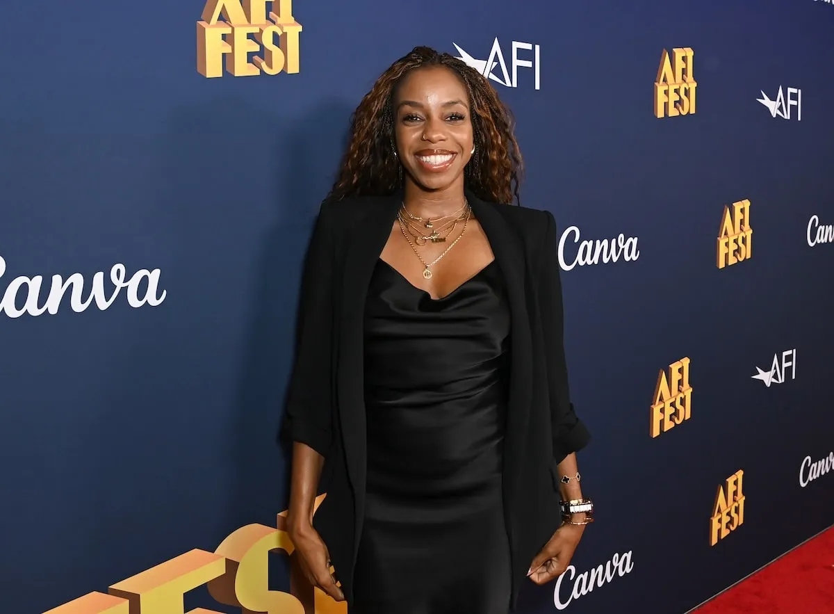 Comedian London Hughes stands on the red carpet at AFI Fest 2024