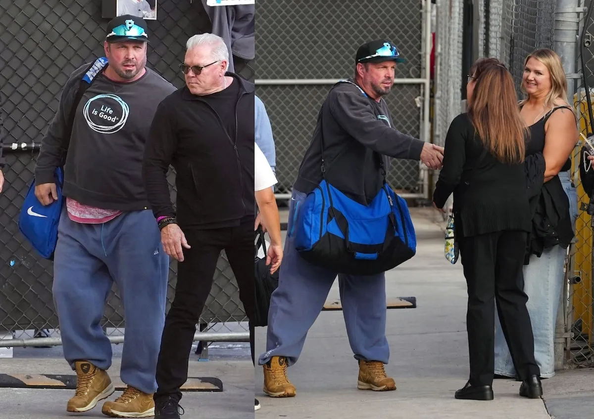 Wearing a gray sweatshirt and blue sweatpants, Garth Brooks greets fans outside of Jimmy Kimmel Live studios