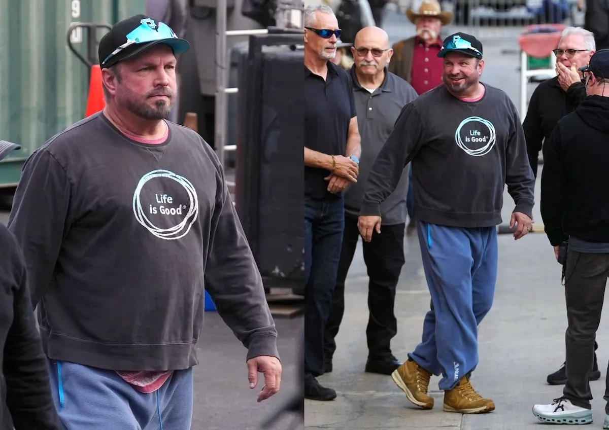 Wearing a gray sweatshirt and blue sweatpants, Garth Brooks greets fans outside of Jimmy Kimmel Live studios