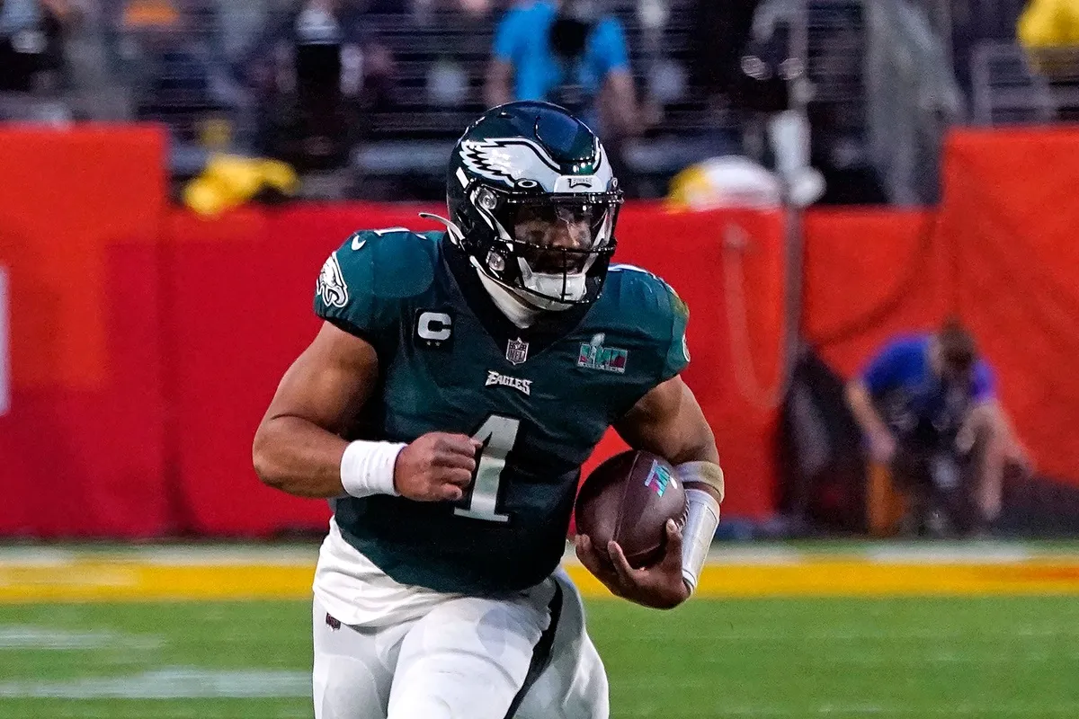 Jalen Hurts runs with the ball during Super Bowl LVII between the Kansas City Chiefs and the Philadelphia Eagles at State Farm Stadium in Glendale, Arizona, on February 12, 2023.