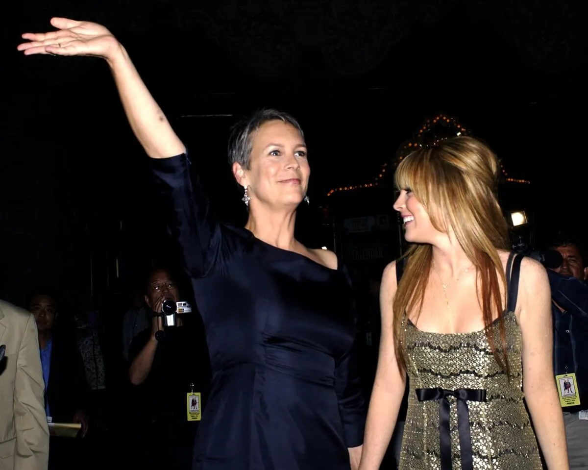 Jamie Lee Curtis posing alongside Lindsay Lohan at the 'Freaky Friday' premiere.