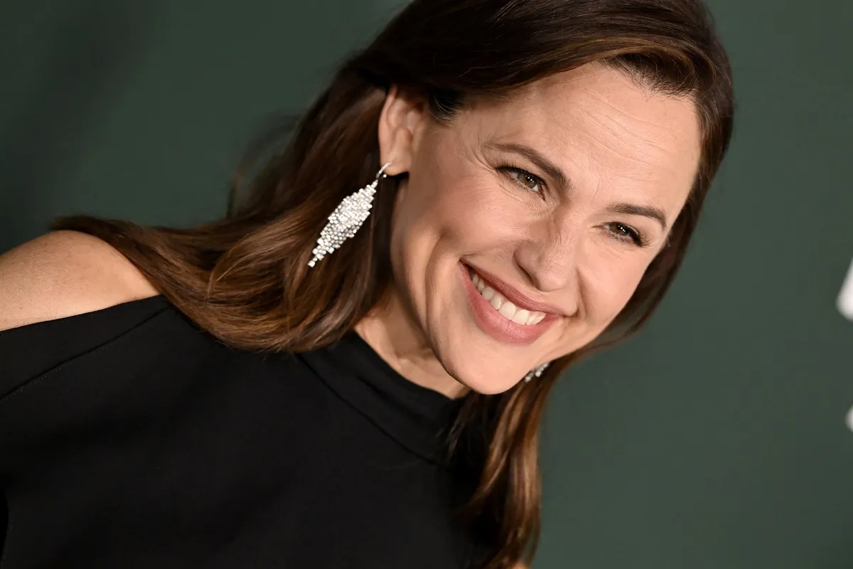 Jennifer Garner posing in a black dress at the 2024 Baby2Baby Gala at Pacific Design Center.