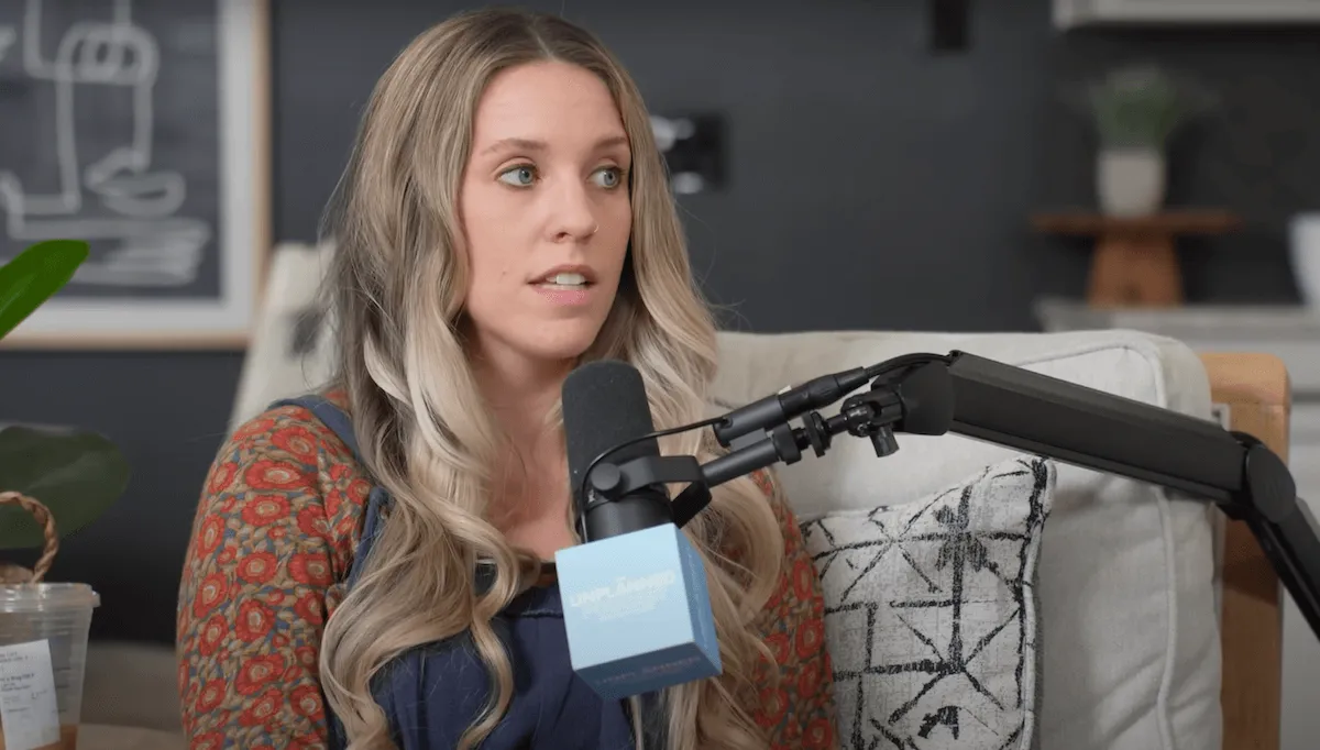 Jill Duggar Dillard talking into a microphone