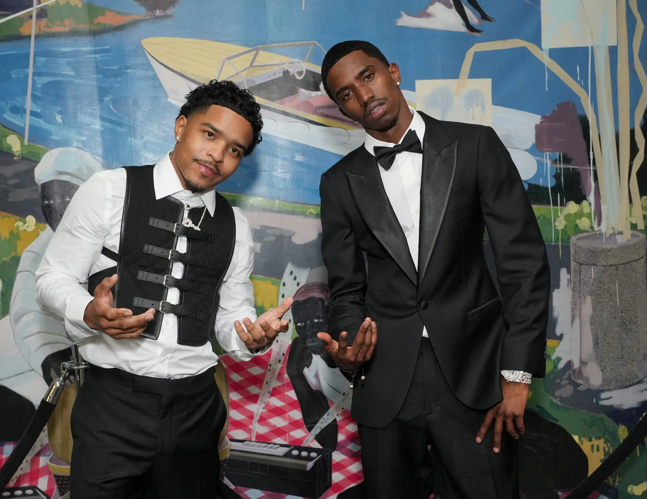 Sean 'Diddy' Combs' sons, Justin Dior Combs and Christian 'King' Combs, dressed up and posing together