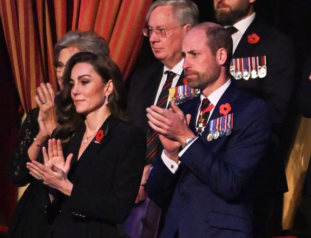 Kate Middleton and Prince William clapping during the Royal British Legion Festival of Remembrance in London