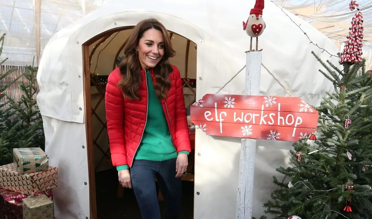 Kate Middleton exits the 'Elf workshop' at Peterley Manor Farm where she took part in Christmas activities with families