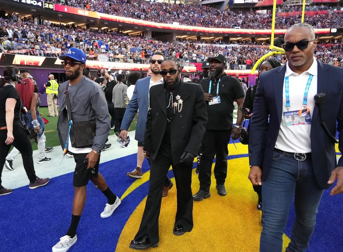 Rapper Kendrick Lamar walks on the field before the Pepsi Super Bowl LVI Halftime Show