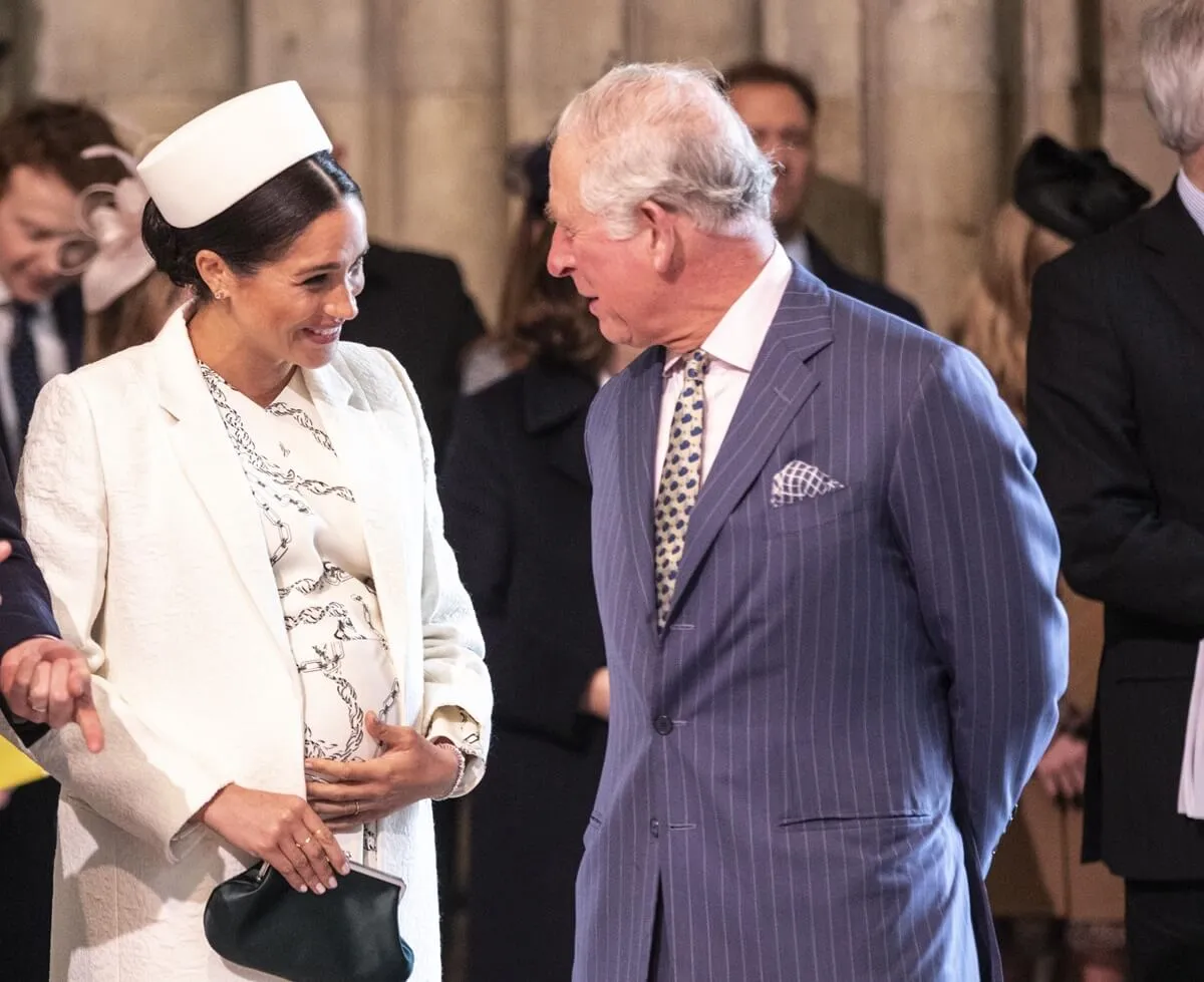 Meghan Markle talks with King Charles at the 2019 Commonwealth Day service