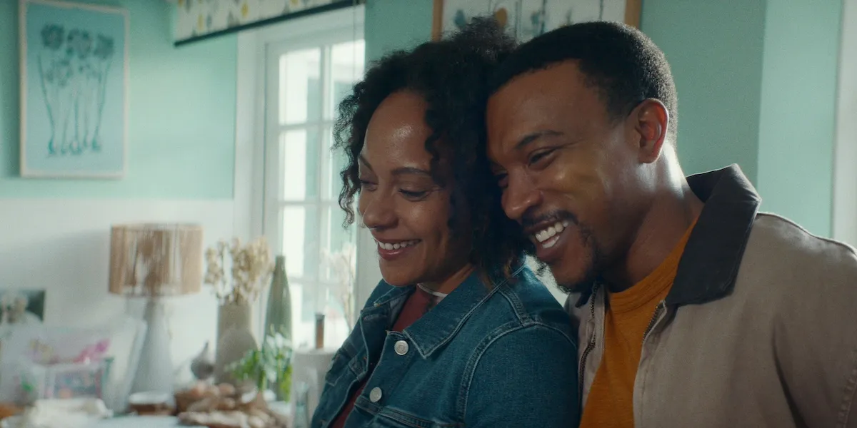 Smiling Black man and woman in 'Missing You' on Netflix