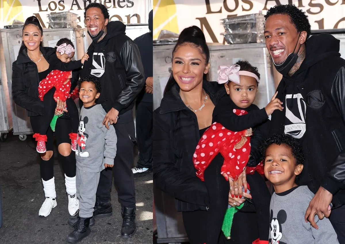 Nick Cannon and Brittany Bell hold their kids Power and Golden